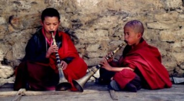 Two Bhutanese Monks playing music